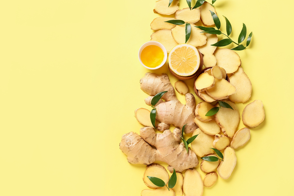 Composition with Fresh Ginger, Honey and Lemon on Color Background